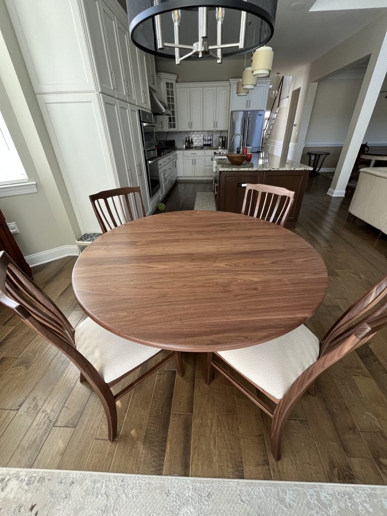 Featured in Premium Walnut, Natural Finish (30 Sheen)
Seat Fabric: C8
8 Pearl